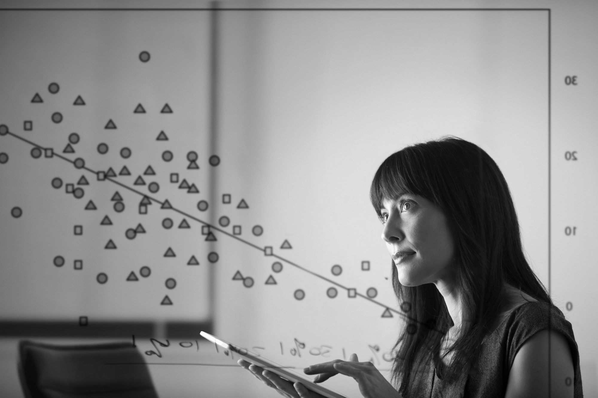 A team member learning on a tablet
